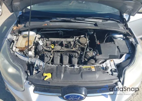 2013 Ford Focus Titanium z USA, uszkodzony, nr VIN 1FADP3J21DL378966